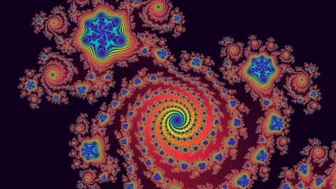 Carnival: a scarlet spiral with a gold core, studded with blue and cyan starbursts on near-black.