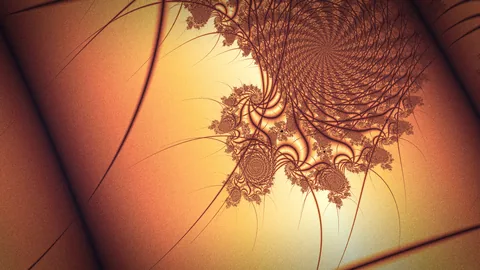 Tinder: a dark coiled cluster burning against sheets of amber and copper light.